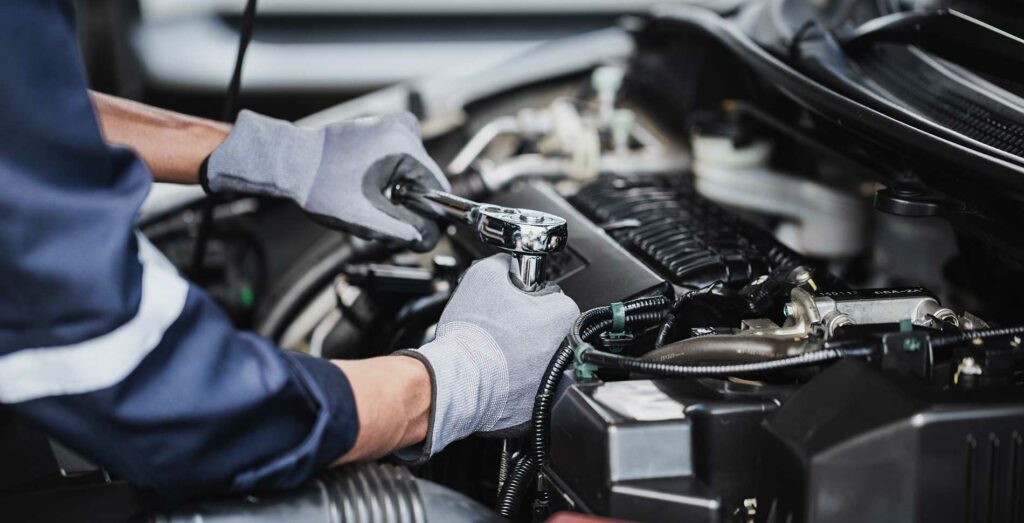 Competitive-Pricing--mechanic-dealing-with-engines