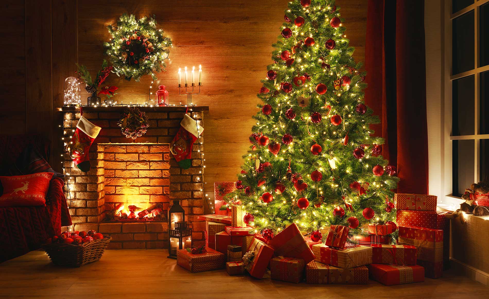 christmas-tree-next-to-a-fire-place